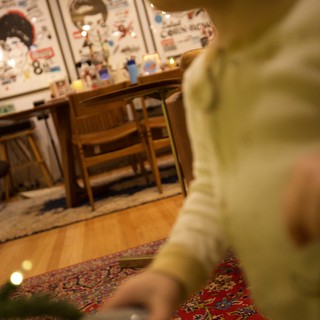 Child Playing on Colorful Oriental Rug in Cozy Room