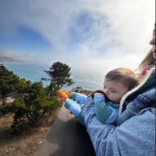 Mother and Child Admiring the Ocean View