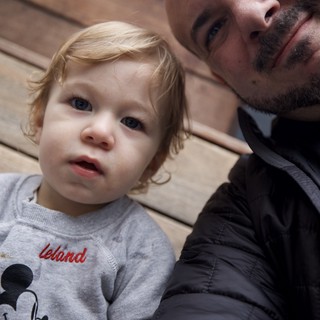 Father and Toddler Selfie on Wooden Deck