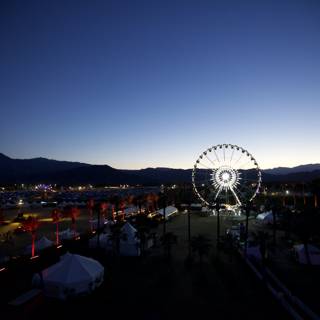 Ferris Wheel at Dusk in Front of Mountains