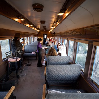 Historic Train Observation Car with Passengers and Performers