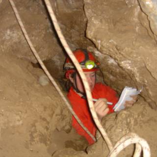 Cave Explorer Examining His Map