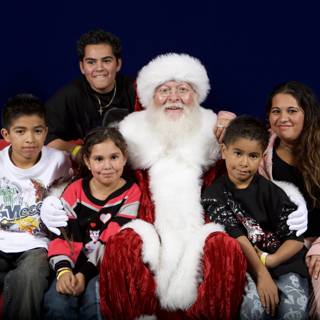 A Festive Family Portrait with Santa Claus