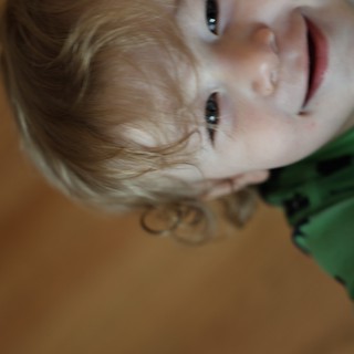 Young Child's Playful Upside-Down Portrait