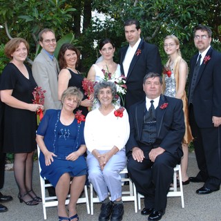 Family Wedding Portrait in Lush Garden Setting