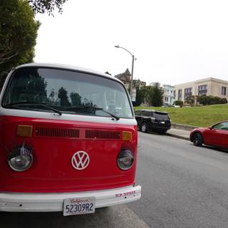 Classic Red and White VW Bus on the Side of the Road