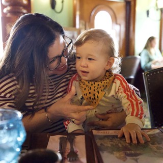Mother and Child Sharing a Moment at Restaurant