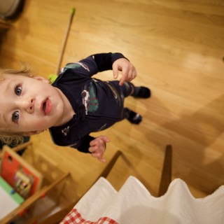 Young Child Playing with Toys on Christmas Morning