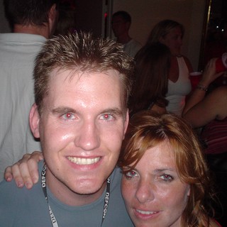 DEFCON 2004 Party Night with Two Smiling Attendees