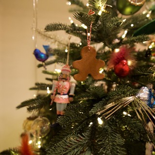 Festive Christmas Tree Decorated with Gingerbread Man and Ornaments