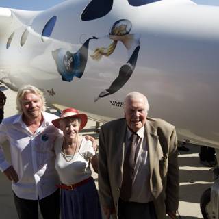 Richard Branson and Companion Pose with Aircraft