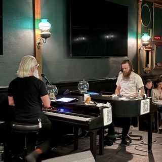 Dueling Pianos Performance in Historic Venue
