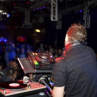 Nightclub DJ working the crowd