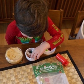 Child Enjoying Christmas Eve Elf Breakfast Activity