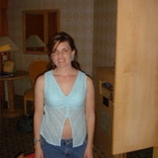 Woman Posing Casually in Hotel Room Interior