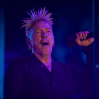 Mohawked Man with Microphone