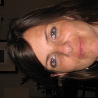 Casual Indoor Portrait of a Smiling Young Woman