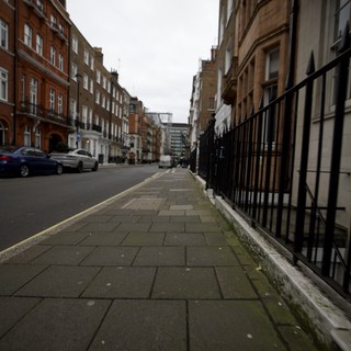 Wet Pavement on a Quiet London Street