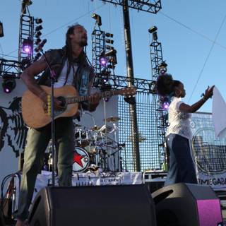 Michael Franti rocking out on stage