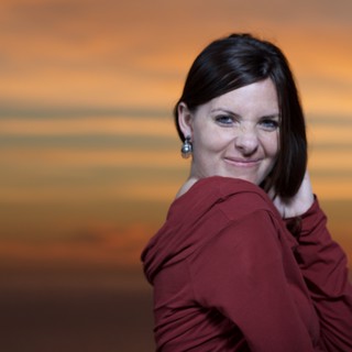 Sunset Portrait of a Woman in Crimson