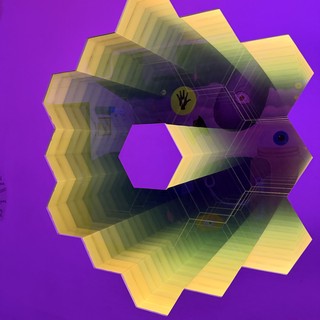 Hexagonal Geometric Art Installation with Prismatic Reflections