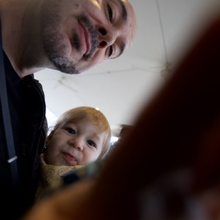 Father and Child Selfie Moment at Dinner