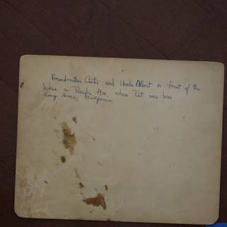 A Handwritten Document on Wooden Surface