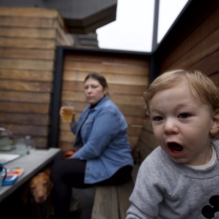 Excited Toddler's Animated Expression in Modern Kitchen
