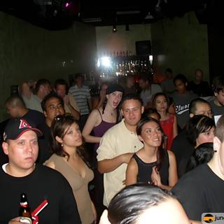Nightclub Party with Drink in Hand