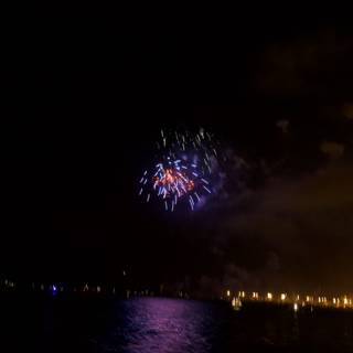 Explosive Fireworks Display Over the Water