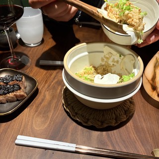 Sharing Salad at an Asian Restaurant Dinner