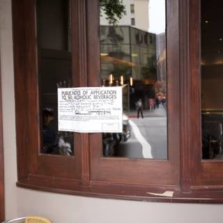 Restaurant Sign on Plywood Window