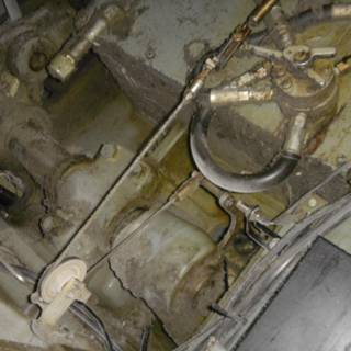 Close-up of Machinery Inside a Rusty Vehicle