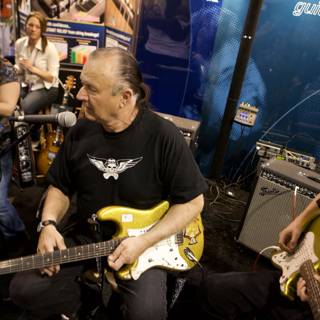 Dick Dale rocks the stage with his electric guitar at 2008 NAMM concert