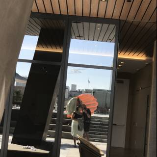 Umbrella Lady in Plywood Building