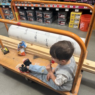 Young Child Enjoying Workshop Time at Home Depot