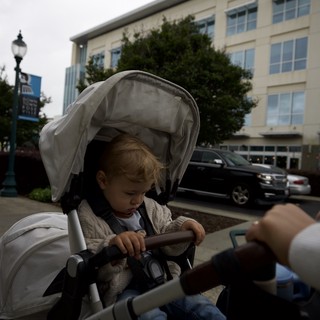 Toddler in Stroller on Urban Sacramento Street