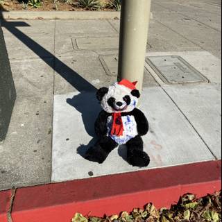 Plush Panda on the Sidewalk