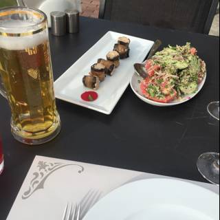 Beer and Food at an Outdoor Table