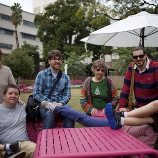 Family Gathering at Outdoor Urban Picnic Table