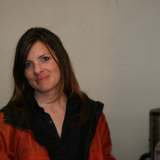 Candid Portrait of Smiling Woman in Indoor Setting