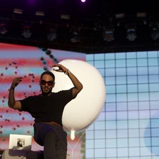 Kaytranada on Stage with White Balloons