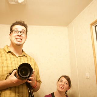 Dave and Penelope Laugh With Camera in Hand