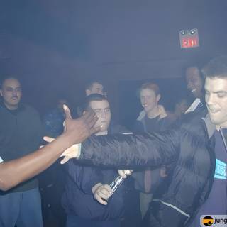 A Handshake at the Night Club