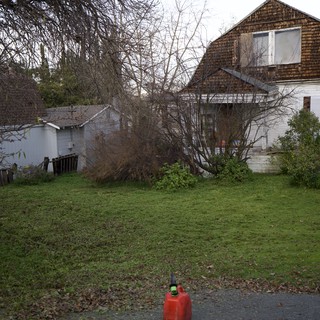 Abandoned Rural Property with Weathered Barn and Outbuildings