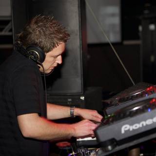 Adam F Jamming on His DJ Mixer