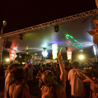 Illuminating the Night: A Crowd Gathers at Coachella Music Festival