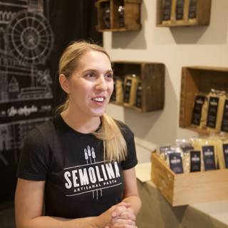 A Woman Poses with Coffee Display at a Los Angeles Shop