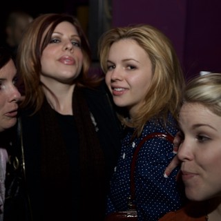 Four Women Socializing at Nightclub Event 2007