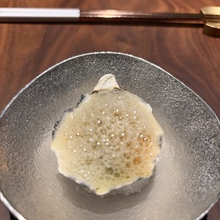 Delicate White Fish Sashimi on Artisan Ceramic Bowl